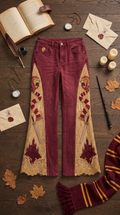 Scarlet Lion wizard house jeans laid flat with gold lion panel
